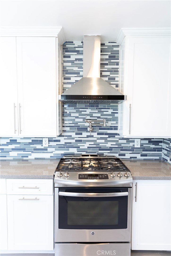 3155 Brookhill Street La Crescenta, CA 91214 - Photo 15 of 28 a stove top oven sitting inside of a kitchen