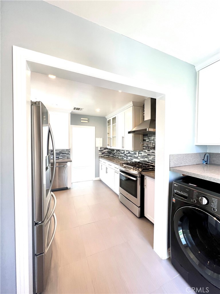 3155 Brookhill Street La Crescenta, CA 91214 - Photo 17 of 28 a kitchen with a stove and a refrigerator