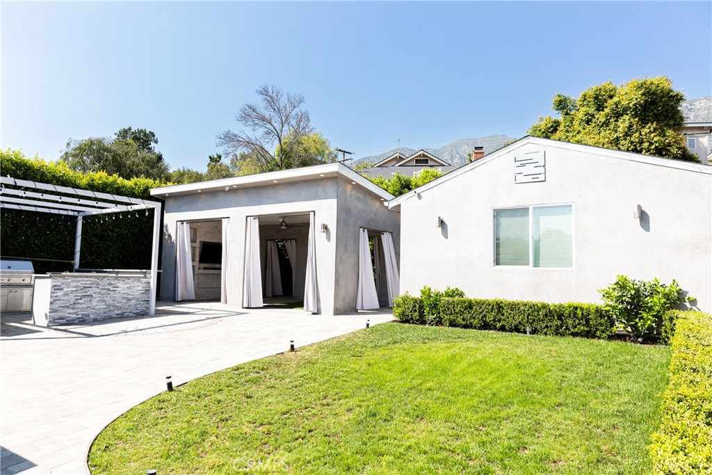 3155 Brookhill Street La Crescenta, CA 91214 - Photo 19 of 28 a front view of a house with a yard