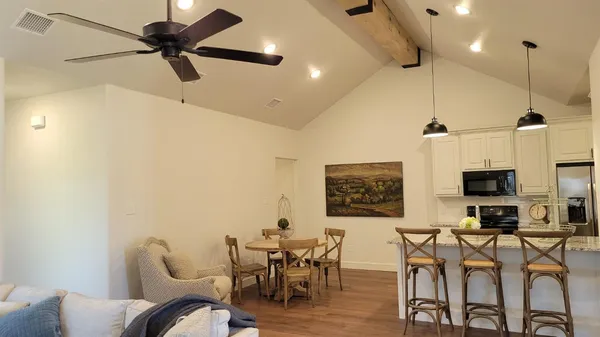 a view of a dining room with furniture