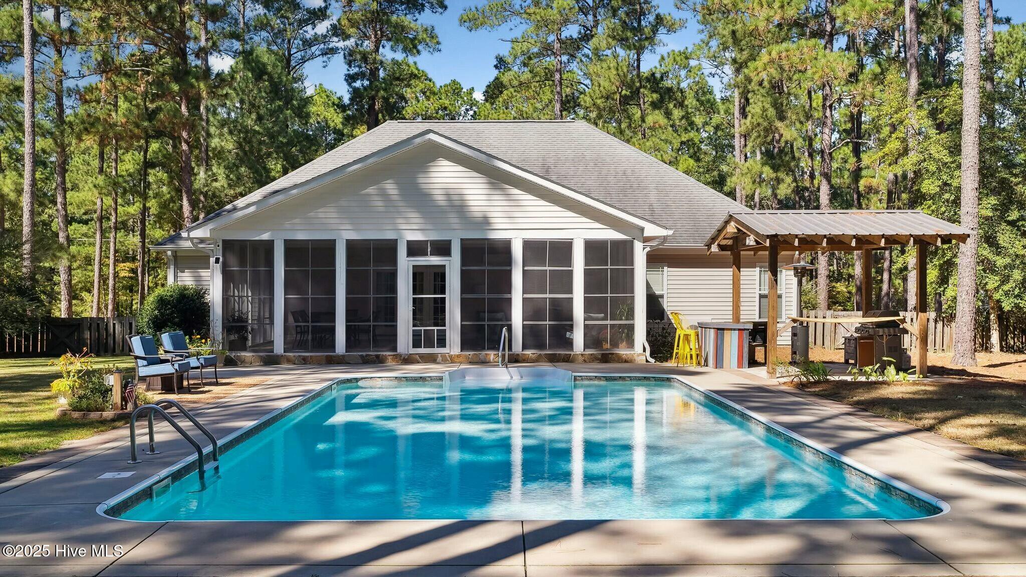 1215 Rays Bridge Road Whispering Pines, NC 28327 - Photo 2 of 54 Pool/Backyard