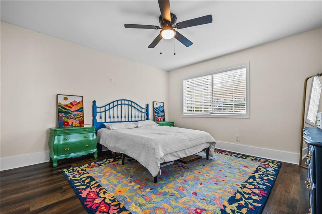 1468 Briarwood Road Northeast, Unit 401 Brookhaven, GA 30319 - Photo 17 of 26 a bedroom with a bed and a table in it