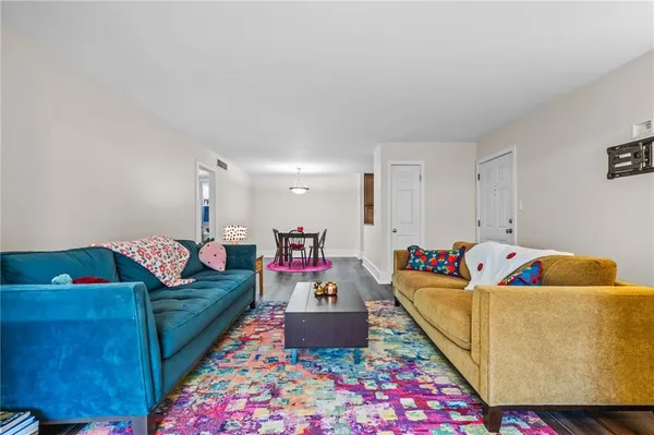 a living room with furniture and a couch