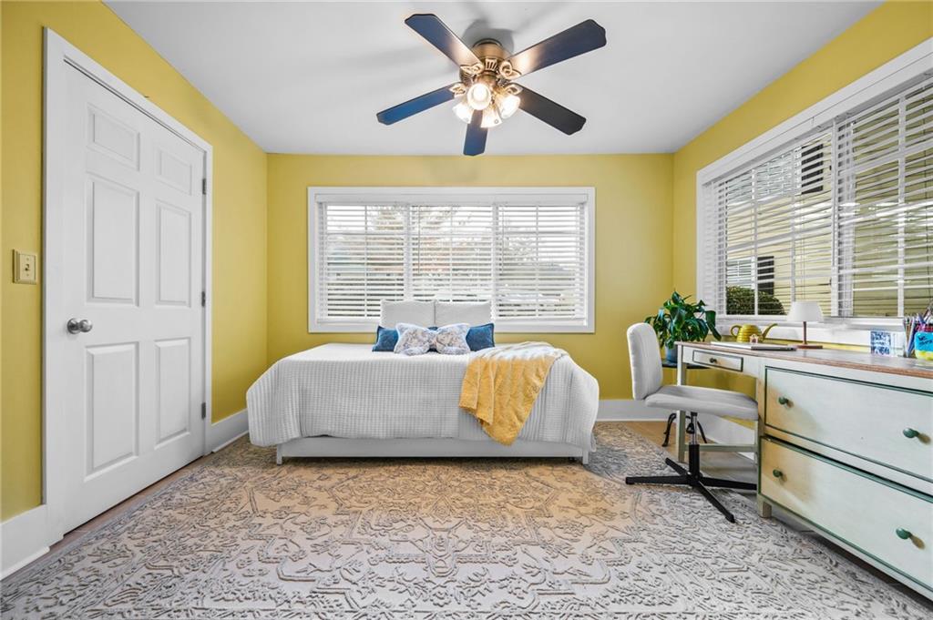 1468 Briarwood Road Northeast, Unit 401 Brookhaven, GA 30319 - Photo 8 of 26 a living room with furniture and a large window