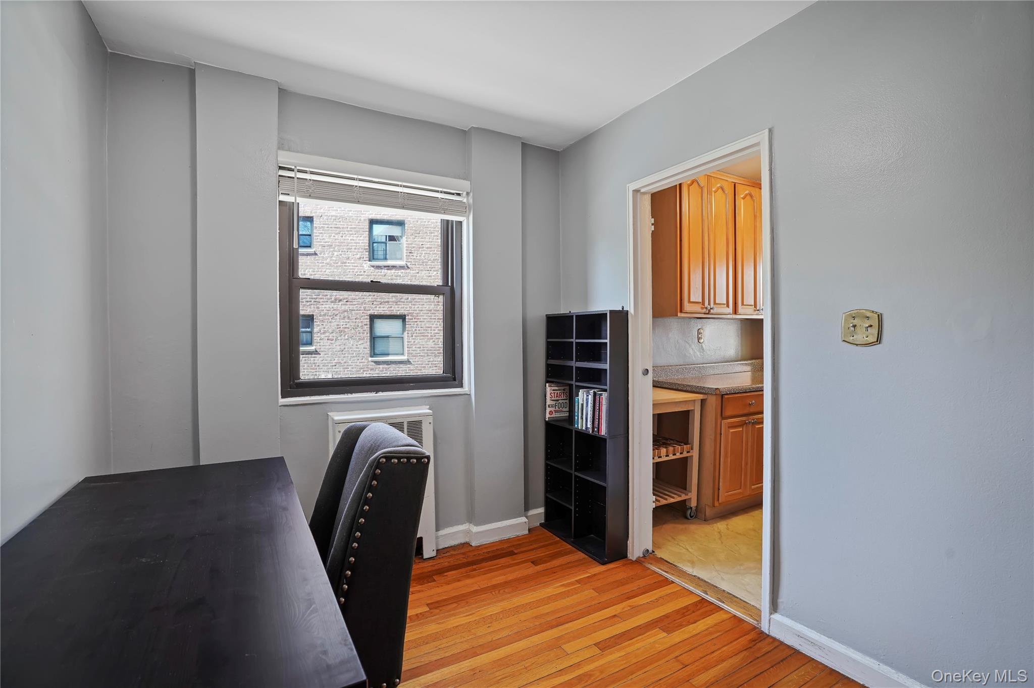 84-18 155th Avenue, Unit 1R Queens, NY 11414 - Photo 14 of 26 a view of a livingroom with furniture and staircase