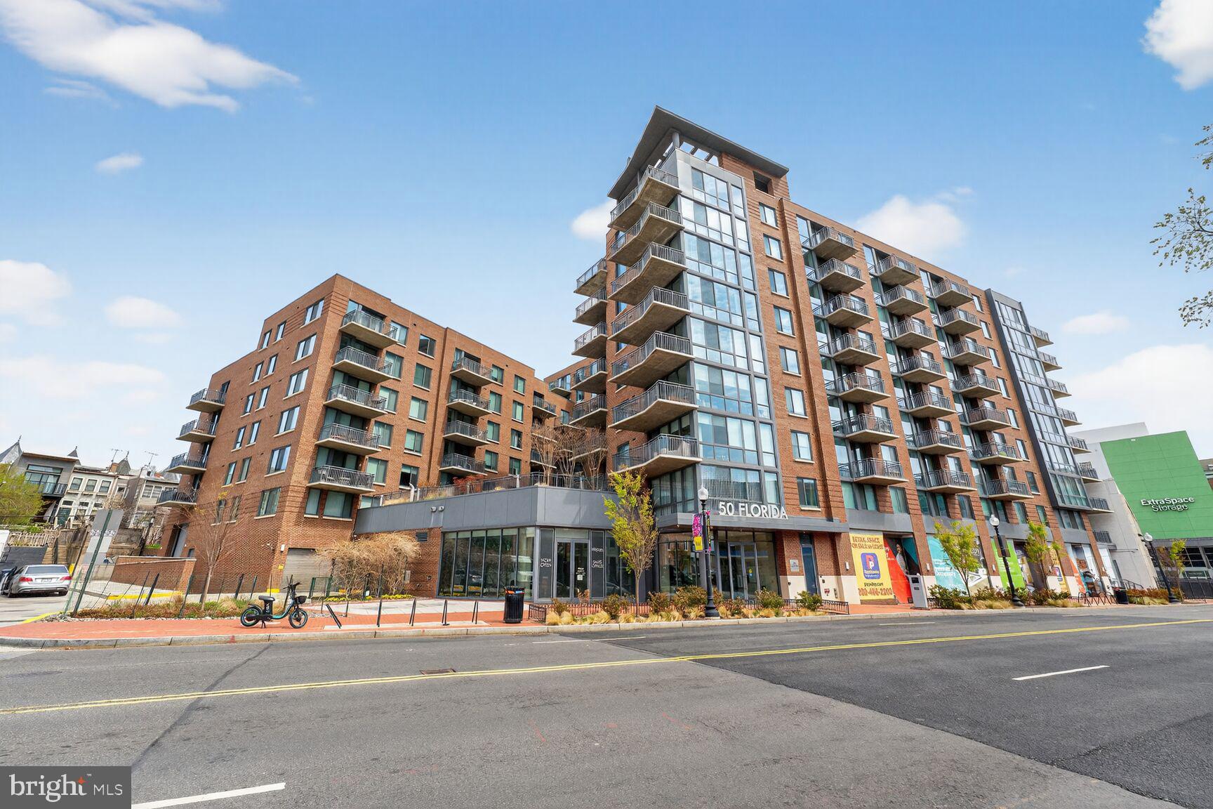 50 Florida Avenue Northeast, Unit 209 Washington, DC 20002 - Photo 1 of 29 a view of a tall building next to a road
