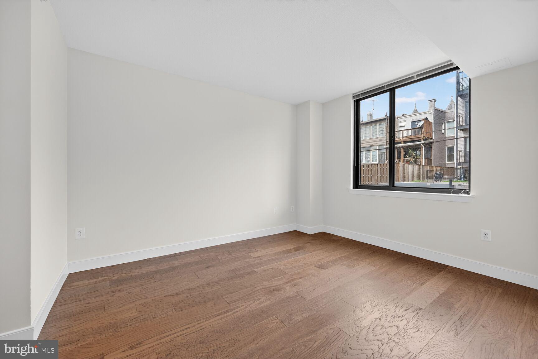 50 Florida Avenue Northeast, Unit 209 Washington, DC 20002 - Photo 11 of 29 an empty room with a window