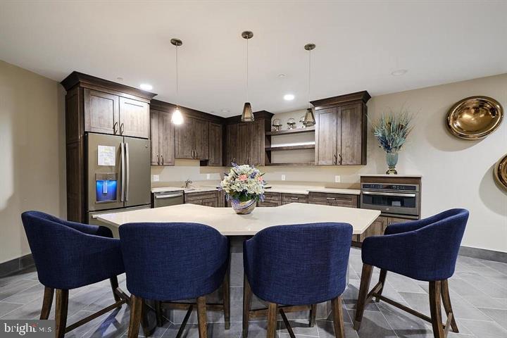 50 Florida Avenue Northeast, Unit 209 Washington, DC 20002 - Photo 23 of 29 a view of a dining room with furniture