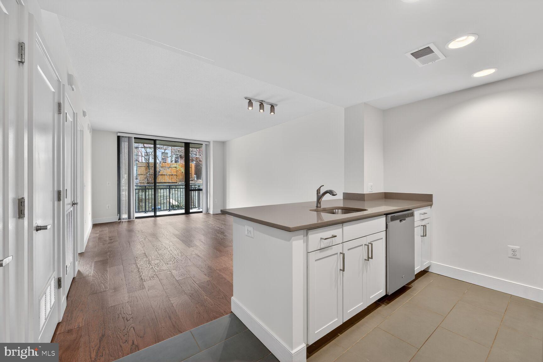 50 Florida Avenue Northeast, Unit 209 Washington, DC 20002 - Photo 5 of 29 a view of a kitchen with a sink and dishwasher