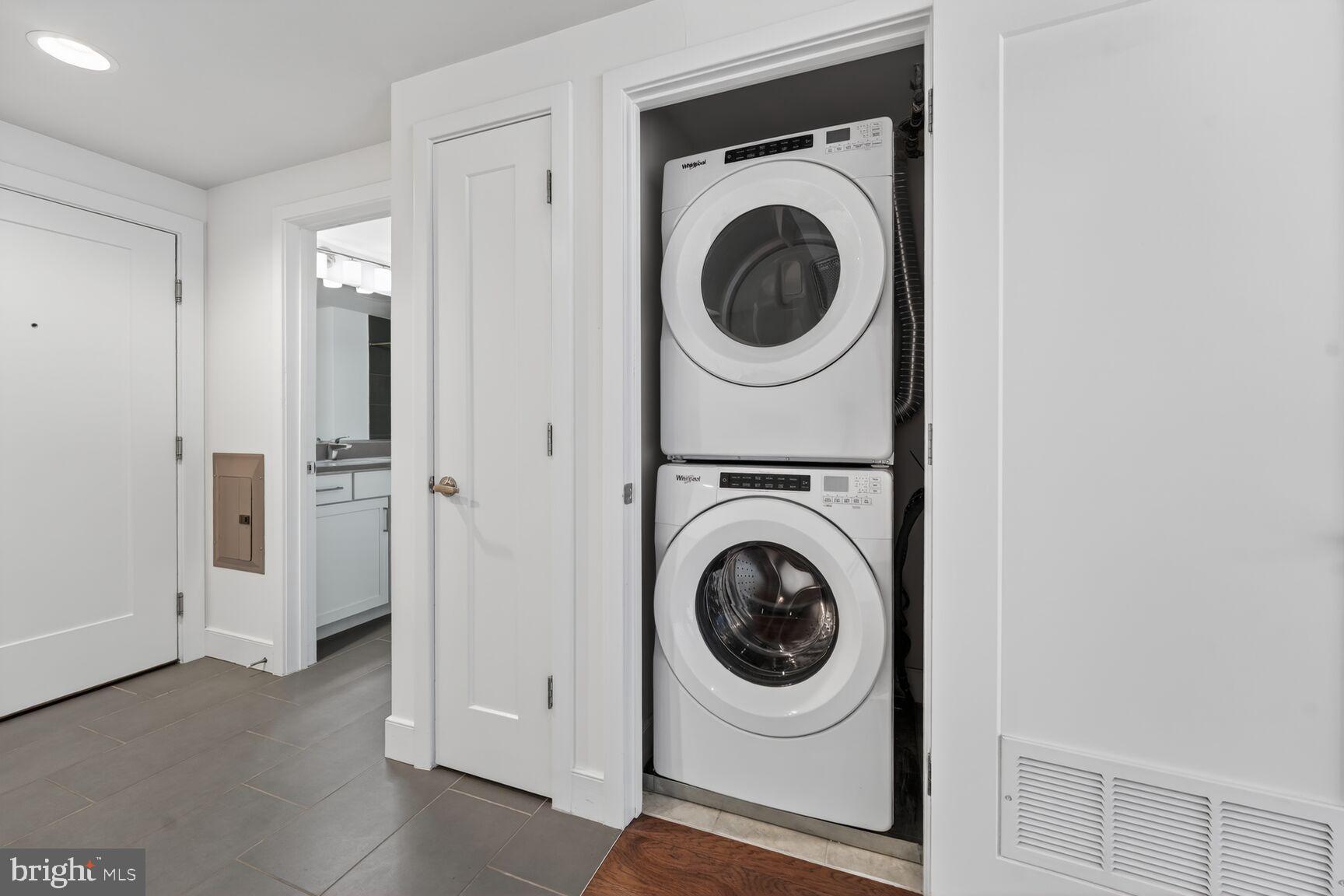 50 Florida Avenue Northeast, Unit 209 Washington, DC 20002 - Photo 10 of 29 a view of a hallway with washer and dryer
