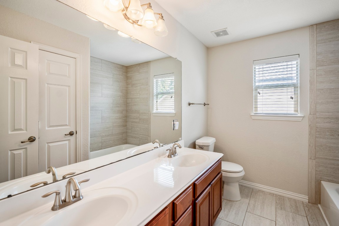 12107 Cove Ridge Lane Cypress, TX 77433 - Photo 33 of 44 Updated Shower in the Upstairs Bath