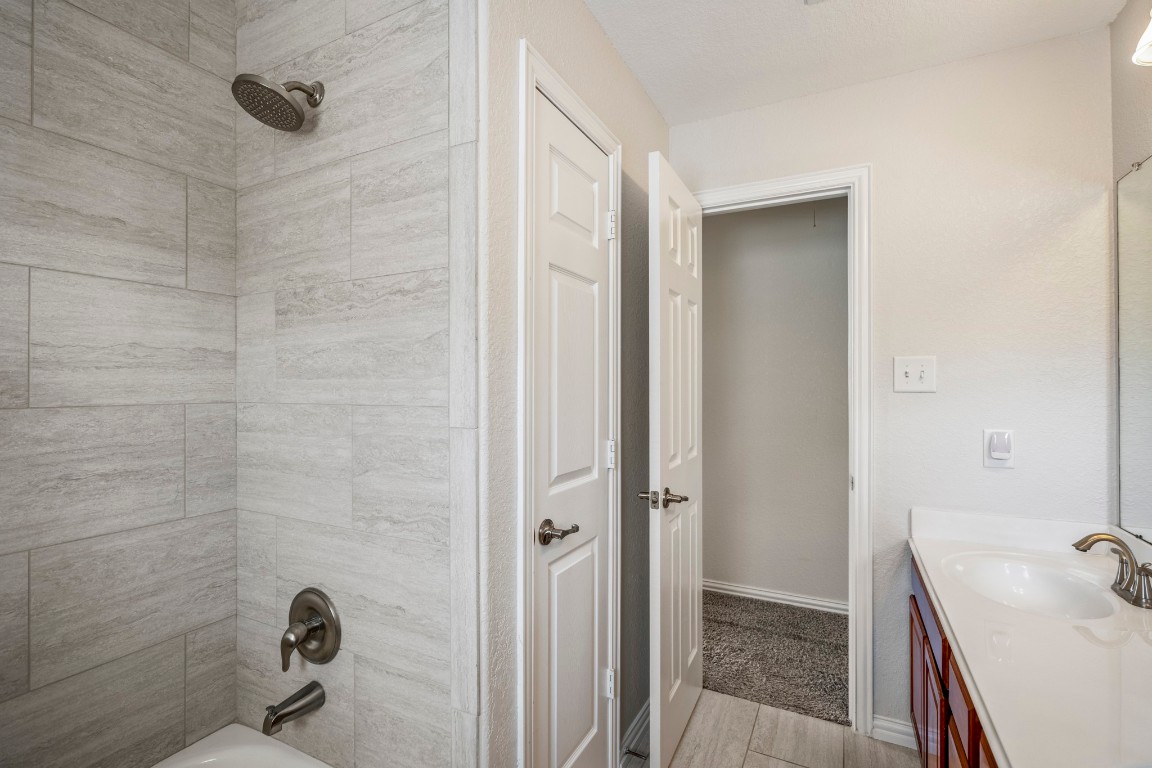 12107 Cove Ridge Lane Cypress, TX 77433 - Photo 34 of 44 Updated Shower in the Upstairs Bath