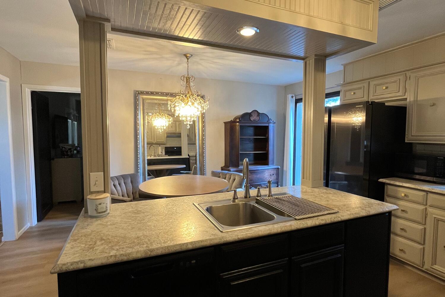8508 Jordan Drive Lubbock, TX 79423 - Photo 11 of 34 a bathroom with a sink and a mirror