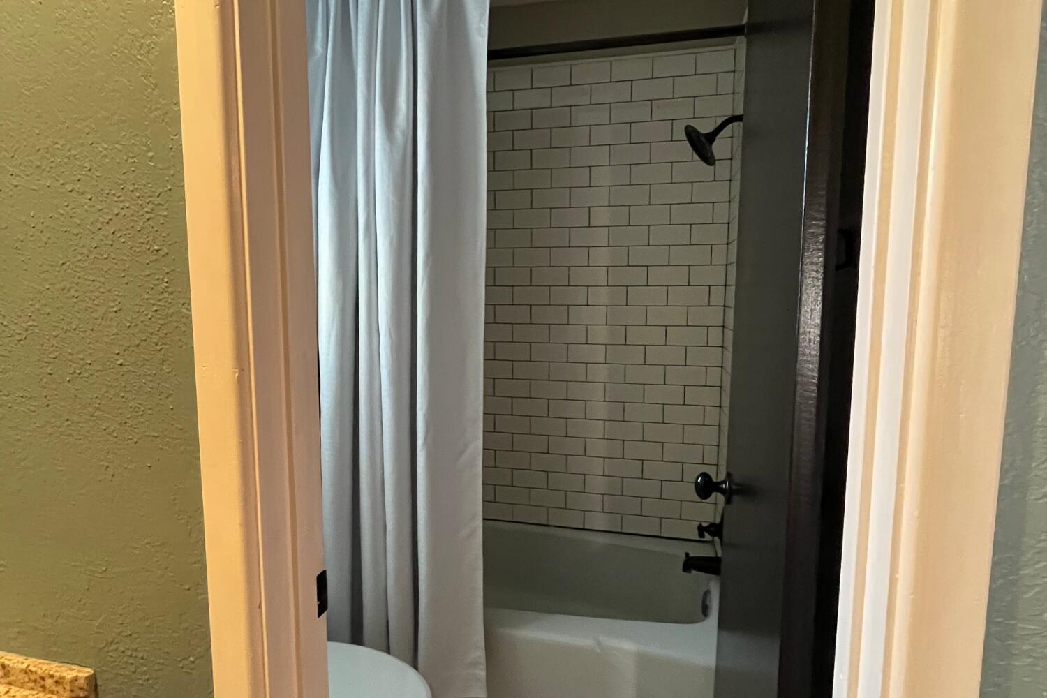 8508 Jordan Drive Lubbock, TX 79423 - Photo 16 of 34 a bathroom with a bathtub