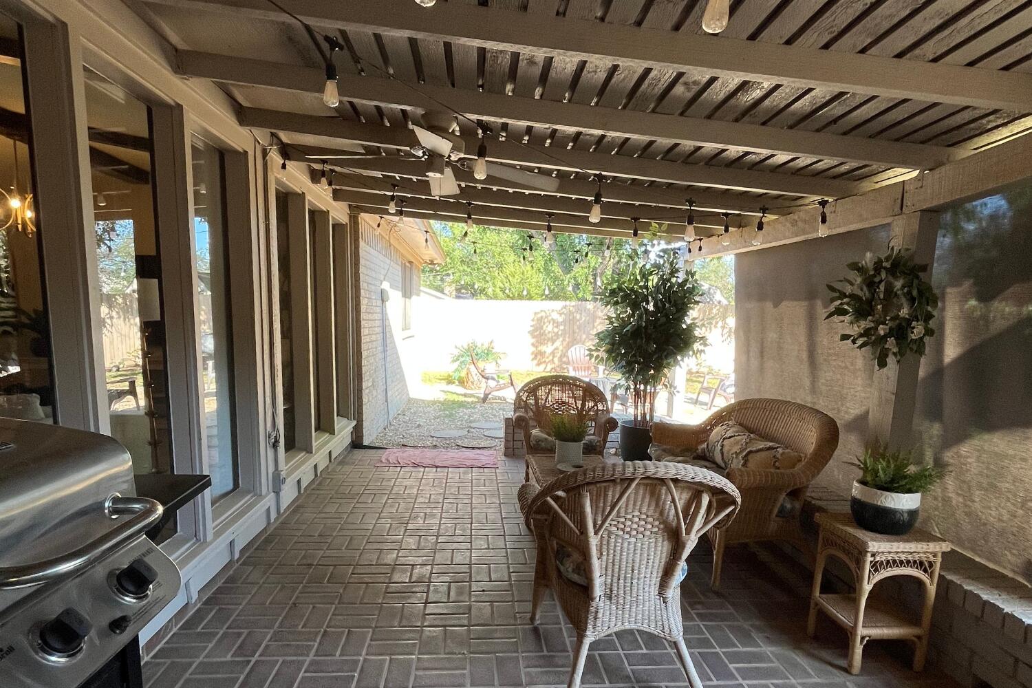 8508 Jordan Drive Lubbock, TX 79423 - Photo 29 of 34 a view of a porch with furniture and a yard