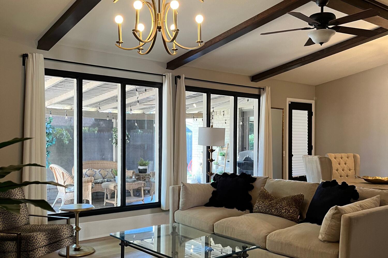 8508 Jordan Drive Lubbock, TX 79423 - Photo 5 of 34 a living room with furniture and floor to ceiling windows