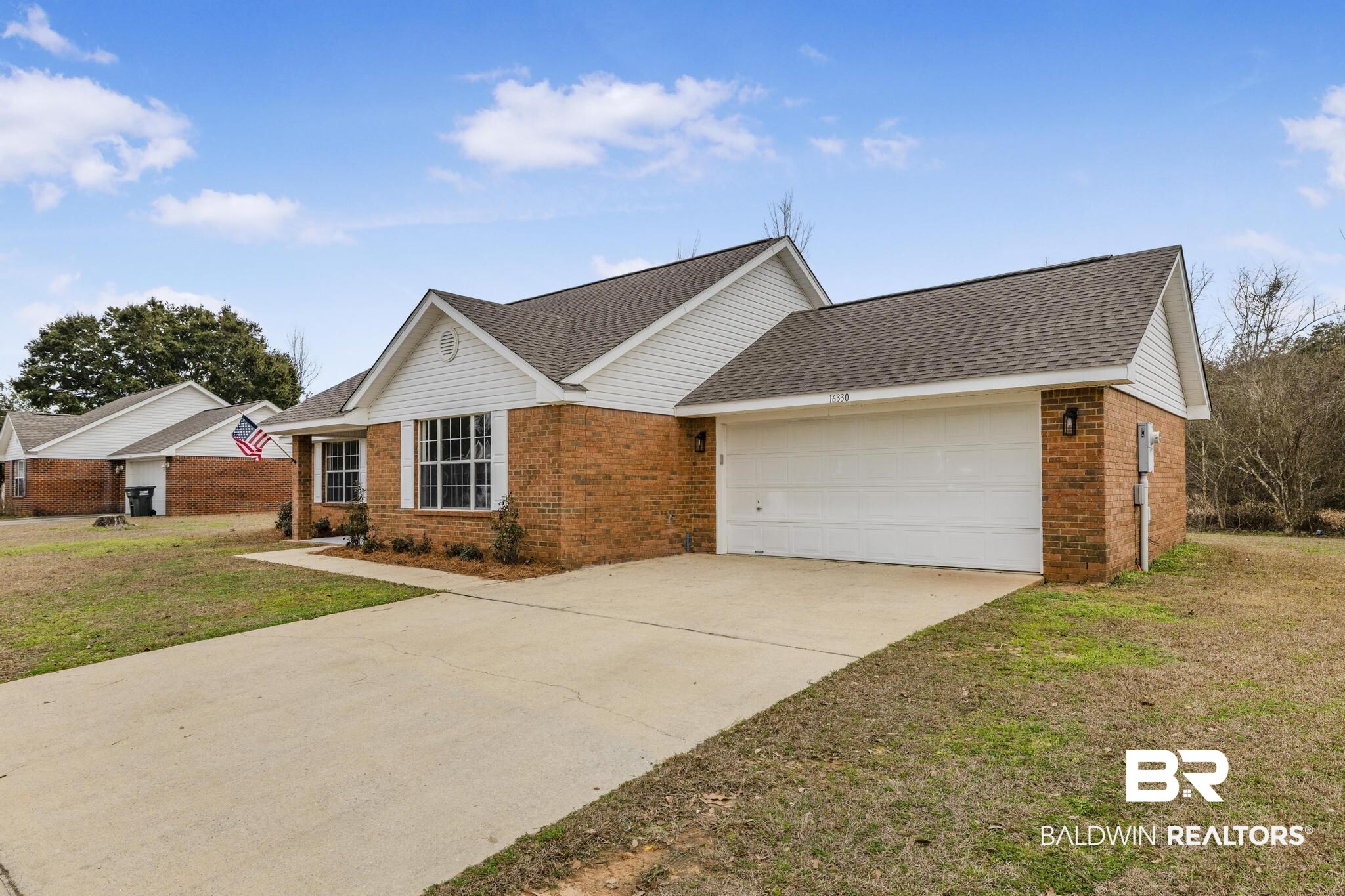 16330 Absalom Street Foley, AL 36535 - Photo 3 of 42 Single story home featuring a garage and a front lawn