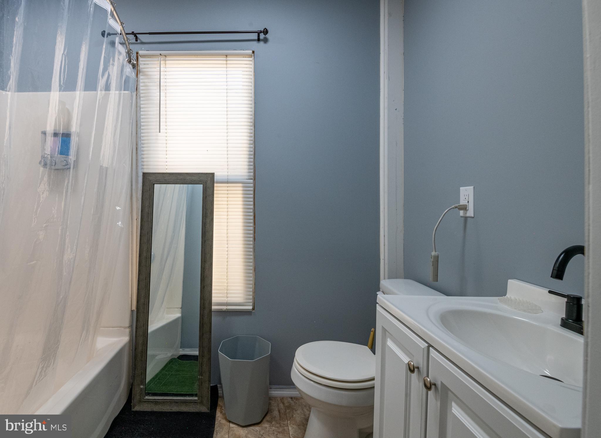 1711 Perkiomen Avenue Reading, PA 19602 - Photo 17 of 20 a bathroom with a sink toilet and shower