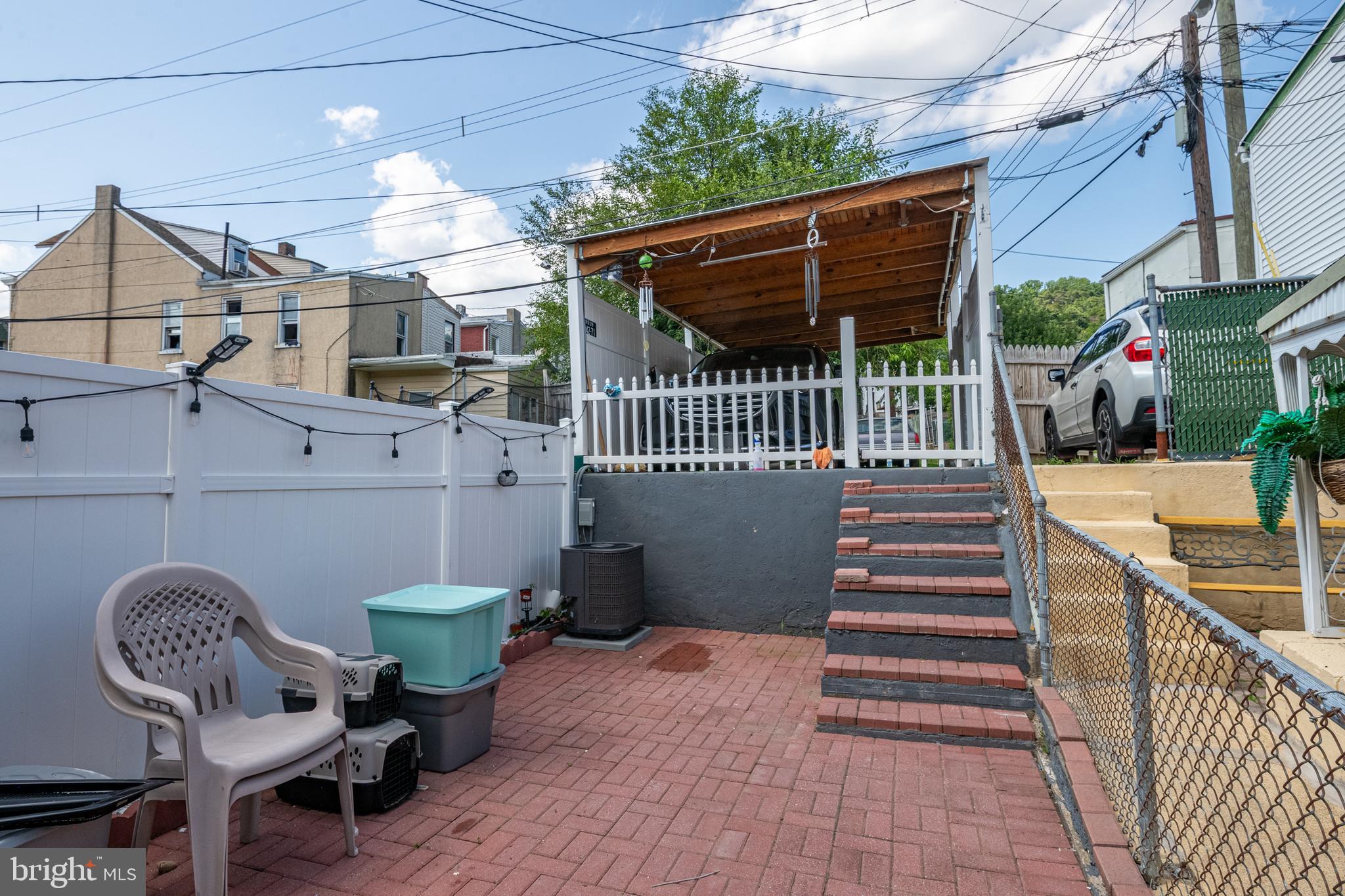 1711 Perkiomen Avenue Reading, PA 19602 - Photo 18 of 20 a view of a balcony with chair and table