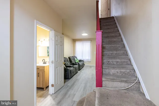 a living room with furniture and a couch