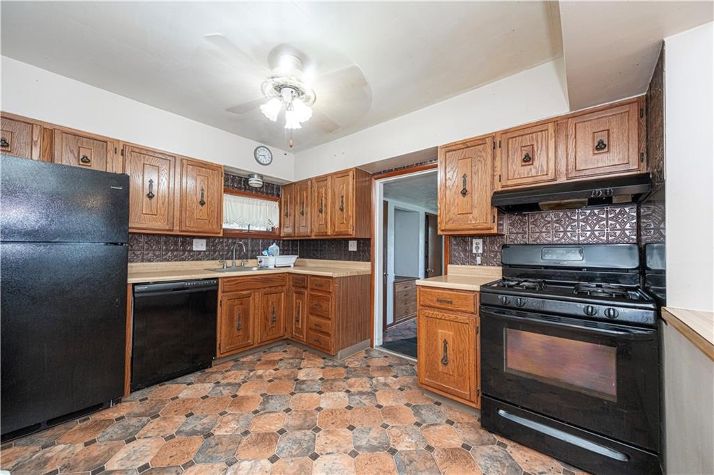 7300 Hutchinson Road Elizabeth, PA 15037 - Photo 10 of 42 Another view of the kitchen, looking into the family room.