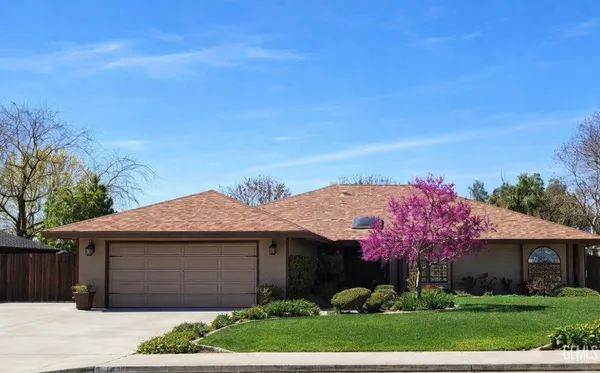 a front view of house with yard