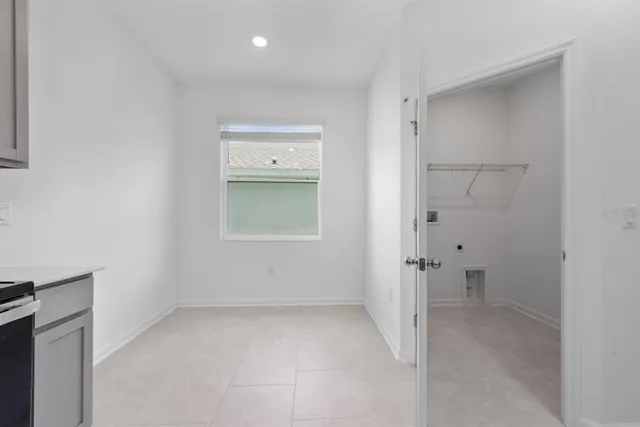 a view of a hallway with closet