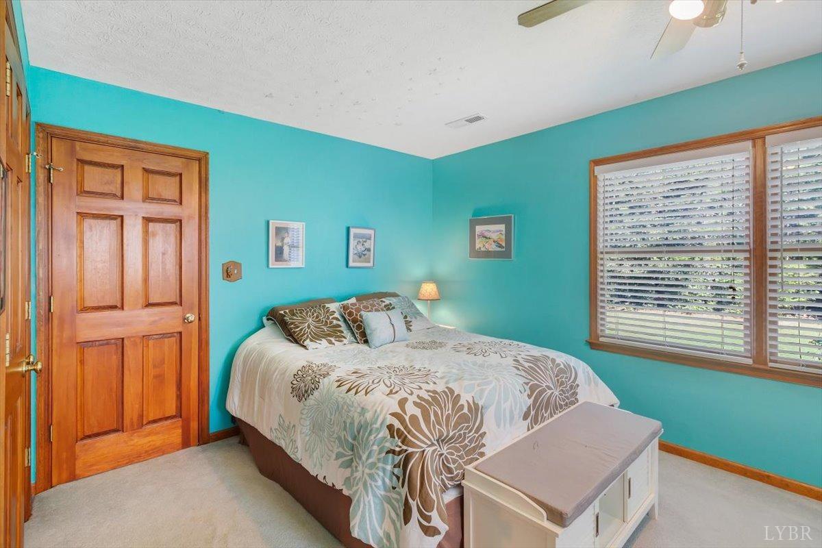 737 Homeplace Road Rustburg, VA 24588 - Photo 29 of 73 a bedroom with a bed and a window