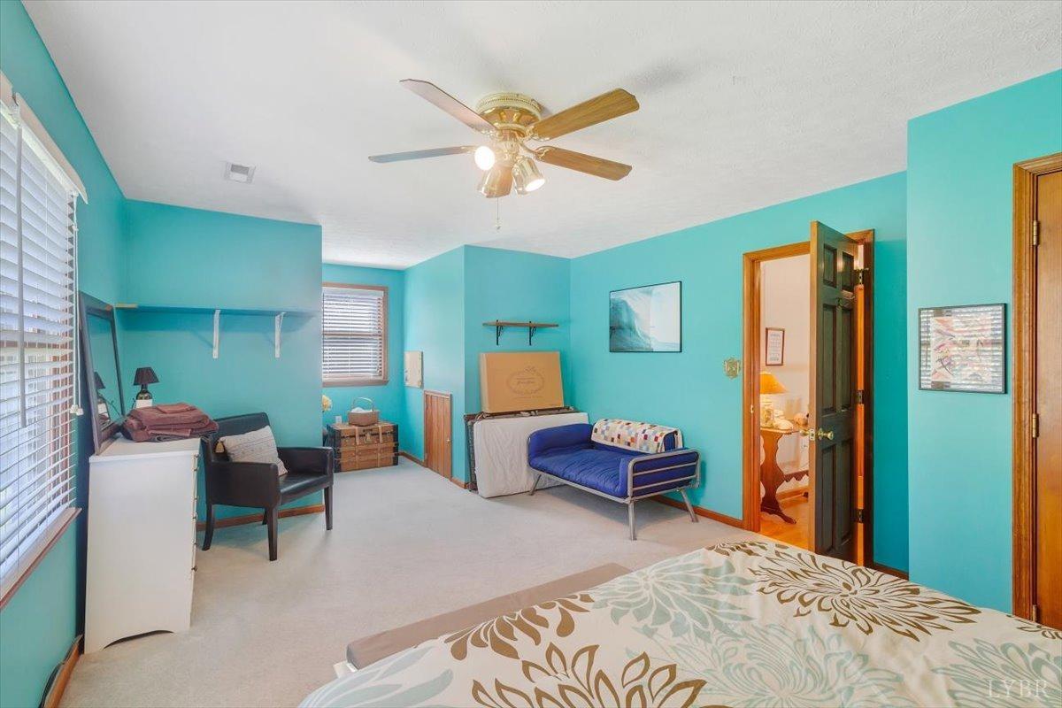 737 Homeplace Road Rustburg, VA 24588 - Photo 30 of 73 a bedroom with a bed and furniture