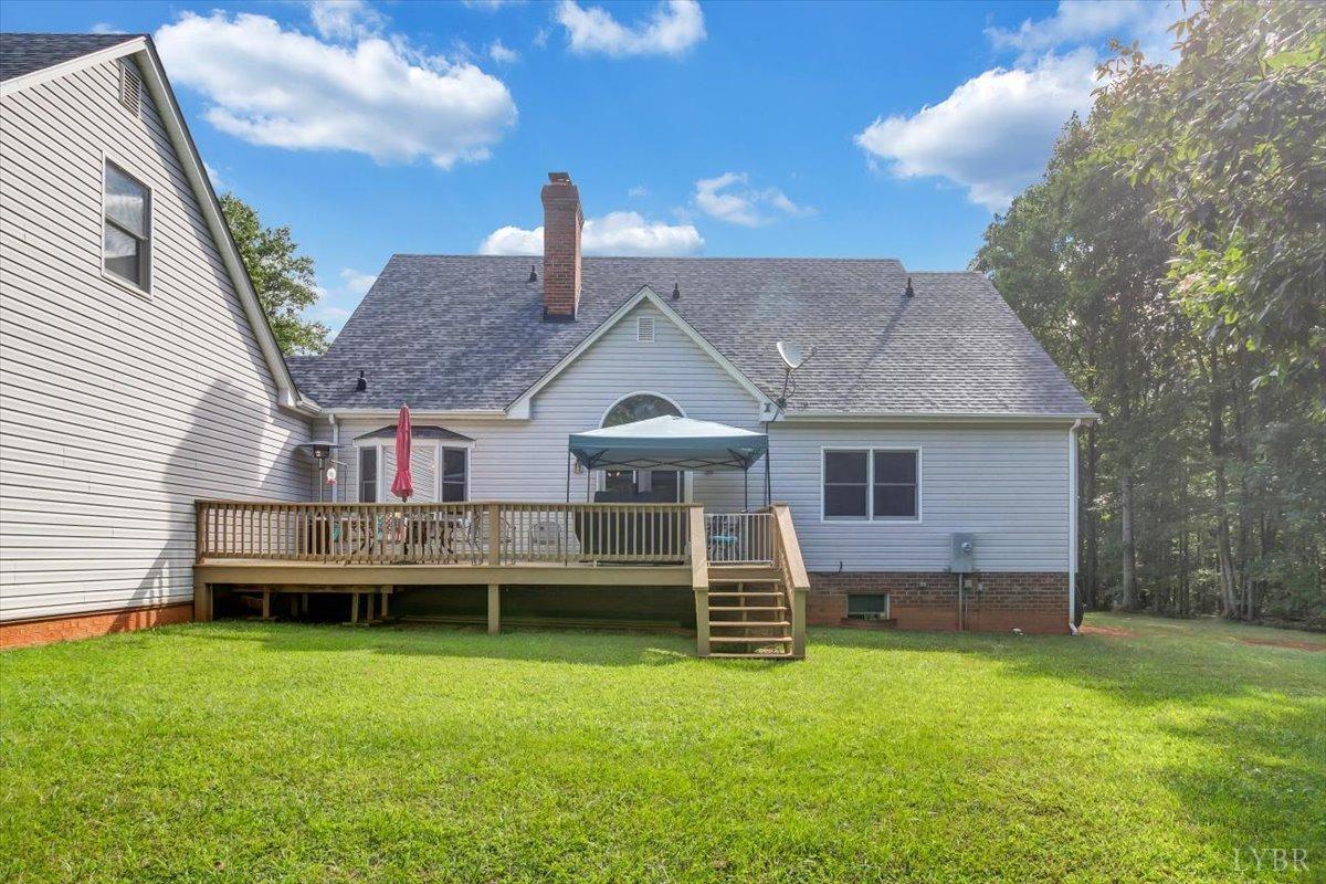 737 Homeplace Road Rustburg, VA 24588 - Photo 46 of 73 a front view of a house with a garden and plants