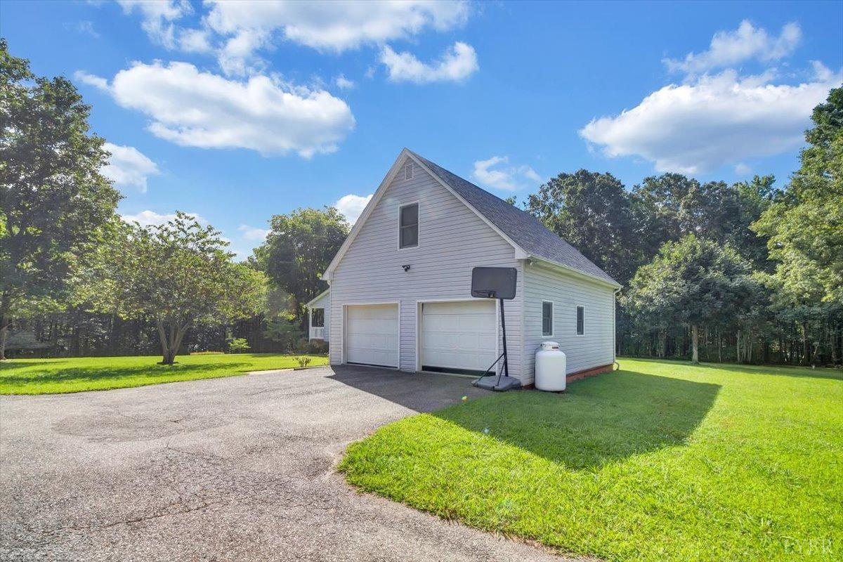 737 Homeplace Road Rustburg, VA 24588 - Photo 50 of 73 a view of a house with a yard and pathway