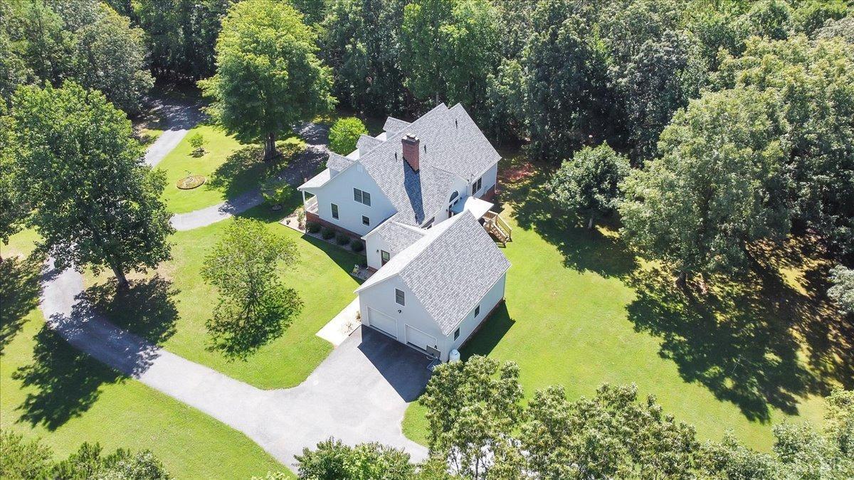 737 Homeplace Road Rustburg, VA 24588 - Photo 58 of 73 an aerial view of a house with a yard and swimming pool
