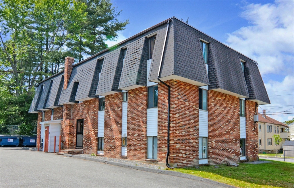 a tall building with large windows
