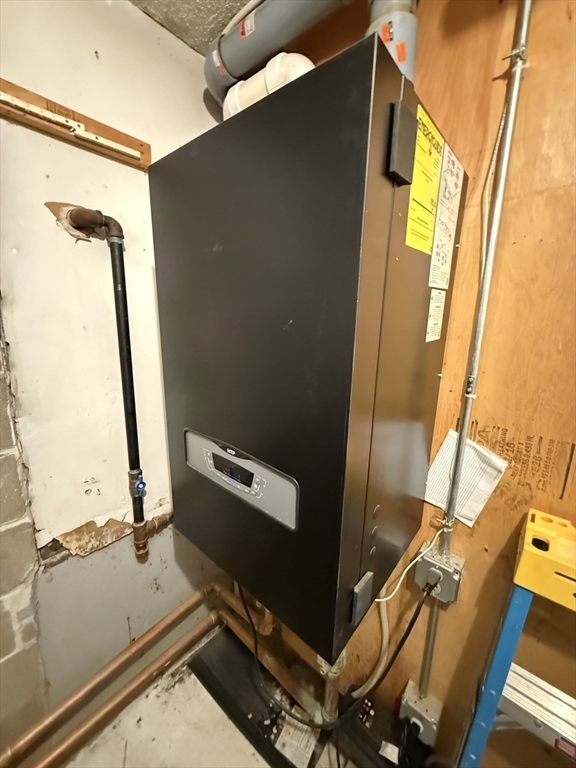 16 A Exeter Street Lawrence, MA 01843 - Photo 11 of 12 a view of a room with gym equipment