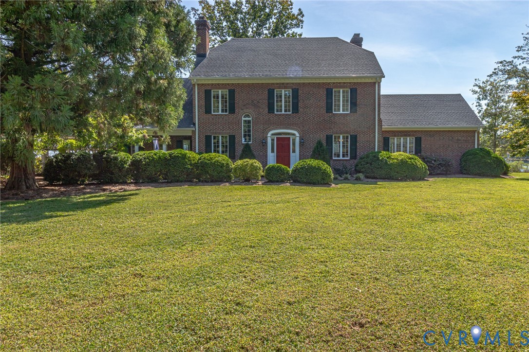 430 Harveys Neck Road Heathsville, VA 22473 - Photo 11 of 51 Traditional brick exterior with a prominent red en
