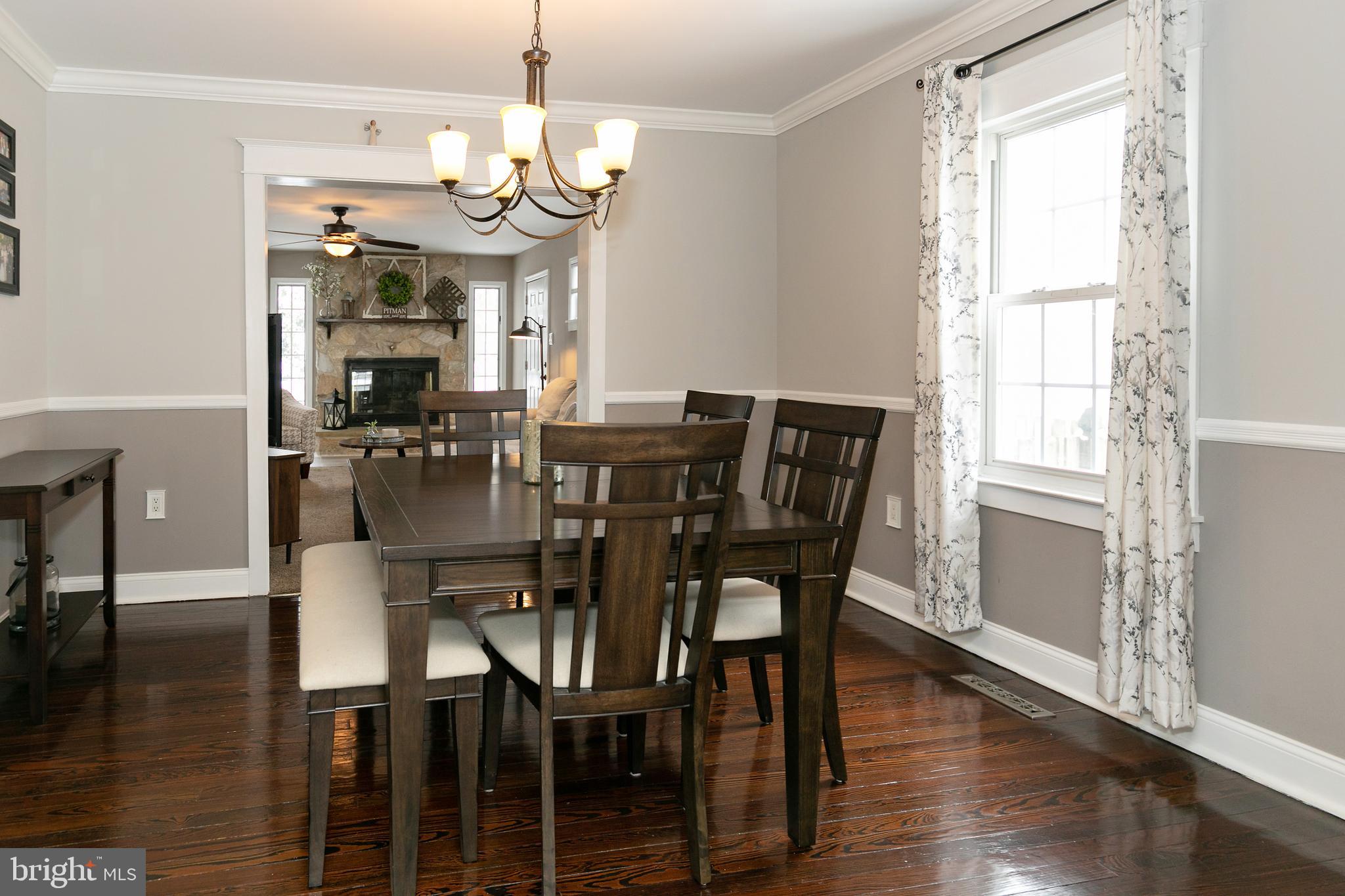 343 Harding Court Pitman, NJ 08071 - Photo 13 of 32 Formal dining room with hardwood flooring
