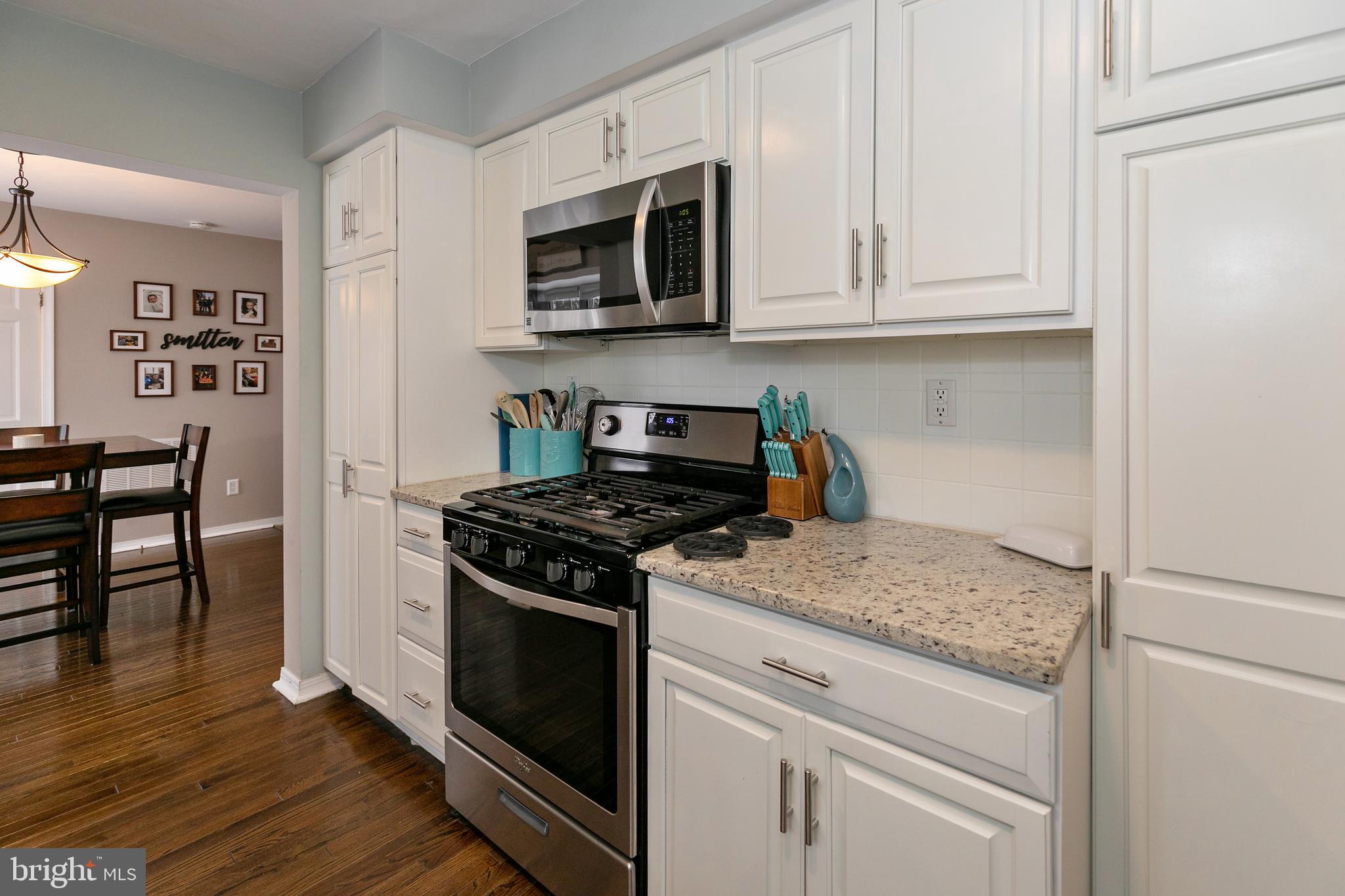 343 Harding Court Pitman, NJ 08071 - Photo 9 of 32 Kitchen with gas range, dishwasher, microwave