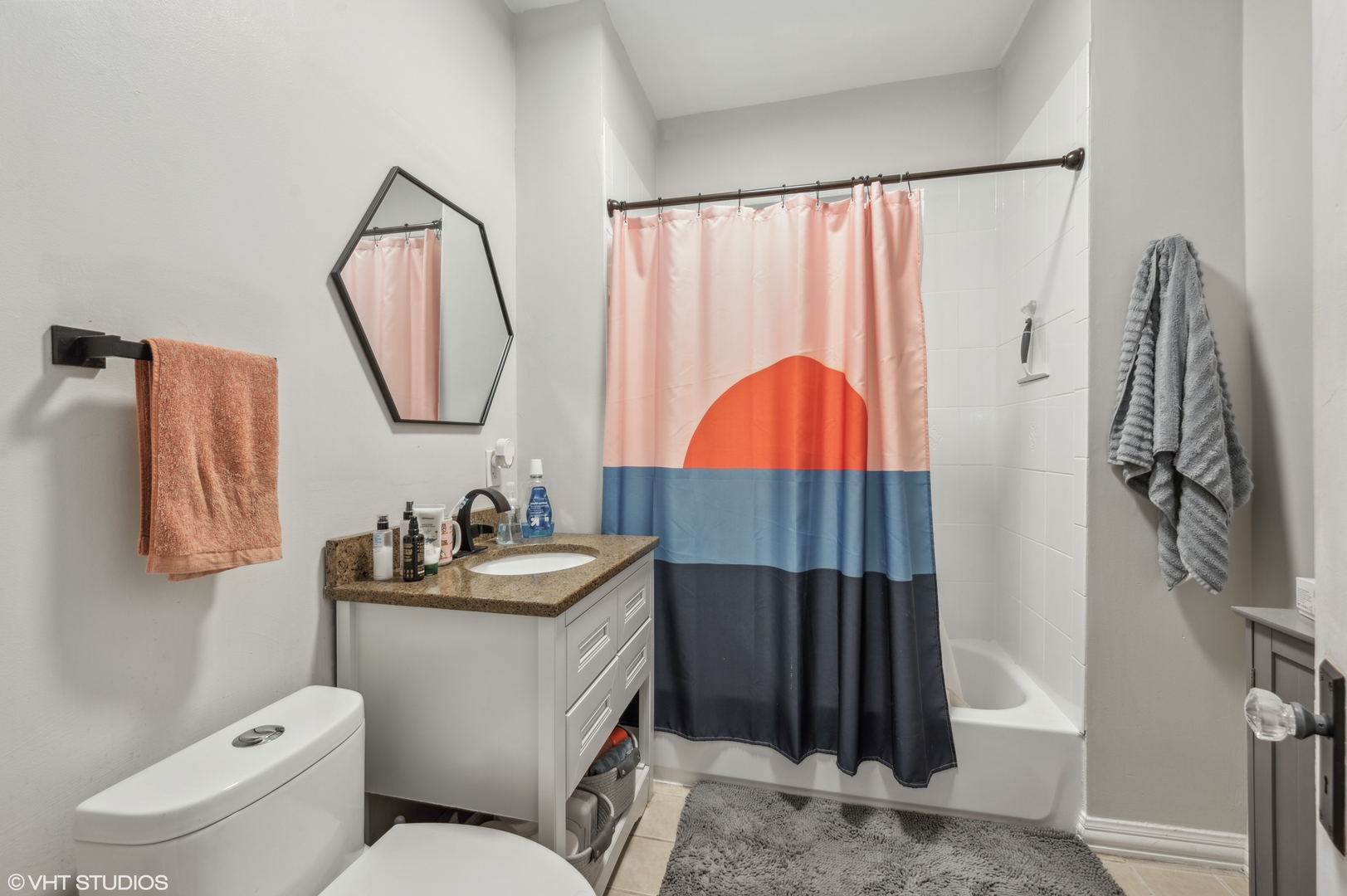 2441 North Avers Avenue Chicago, IL 60647 - Photo 11 of 28 a bathroom with a sink and a mirror