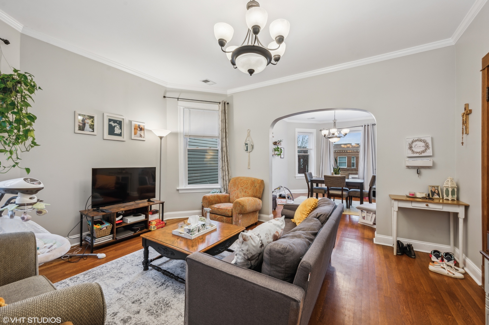 2441 North Avers Avenue Chicago, IL 60647 - Photo 18 of 28 a living room with furniture flat screen tv and wooden floor