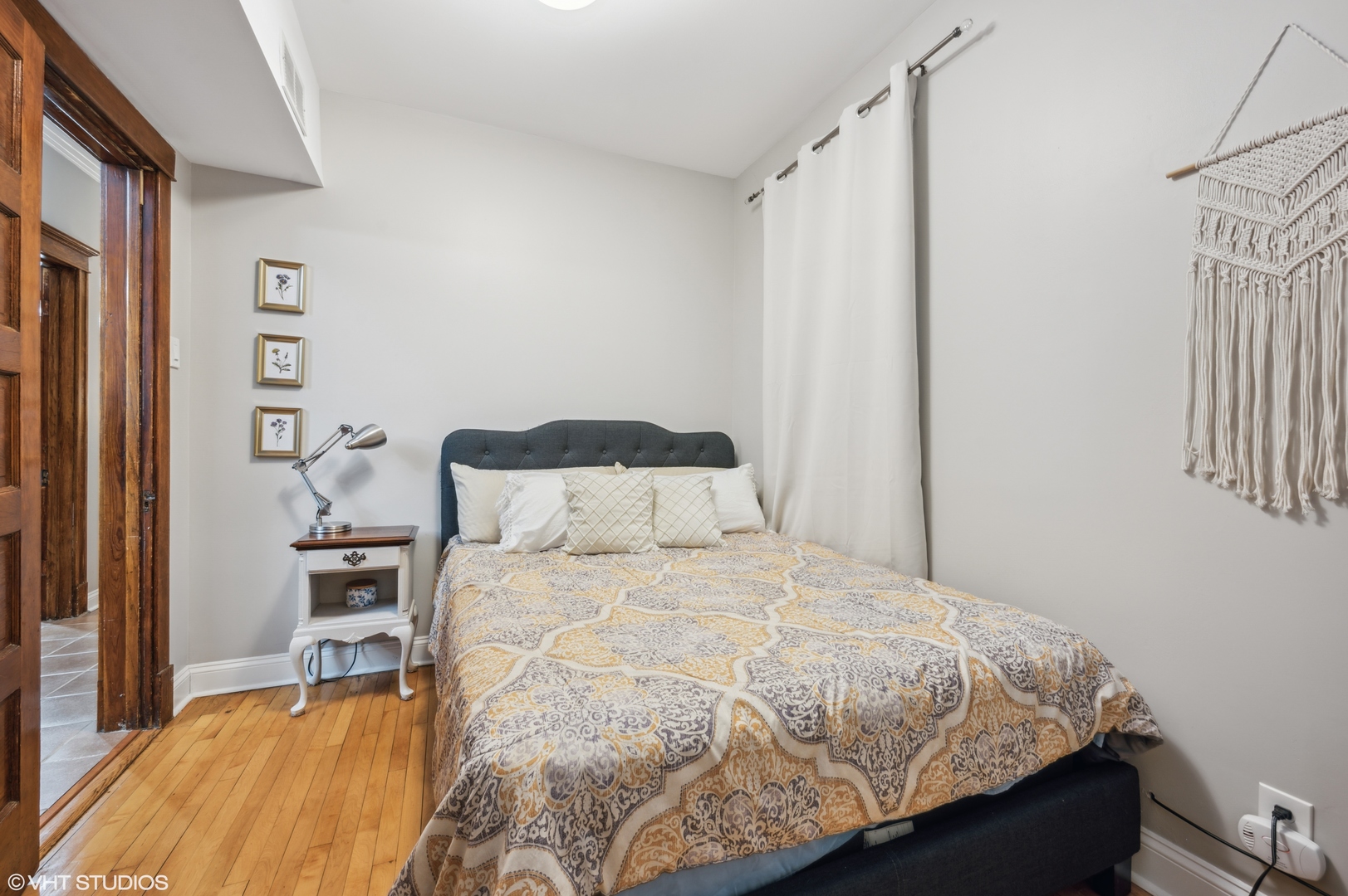 2441 North Avers Avenue Chicago, IL 60647 - Photo 21 of 28 a bedroom with a bed and a window