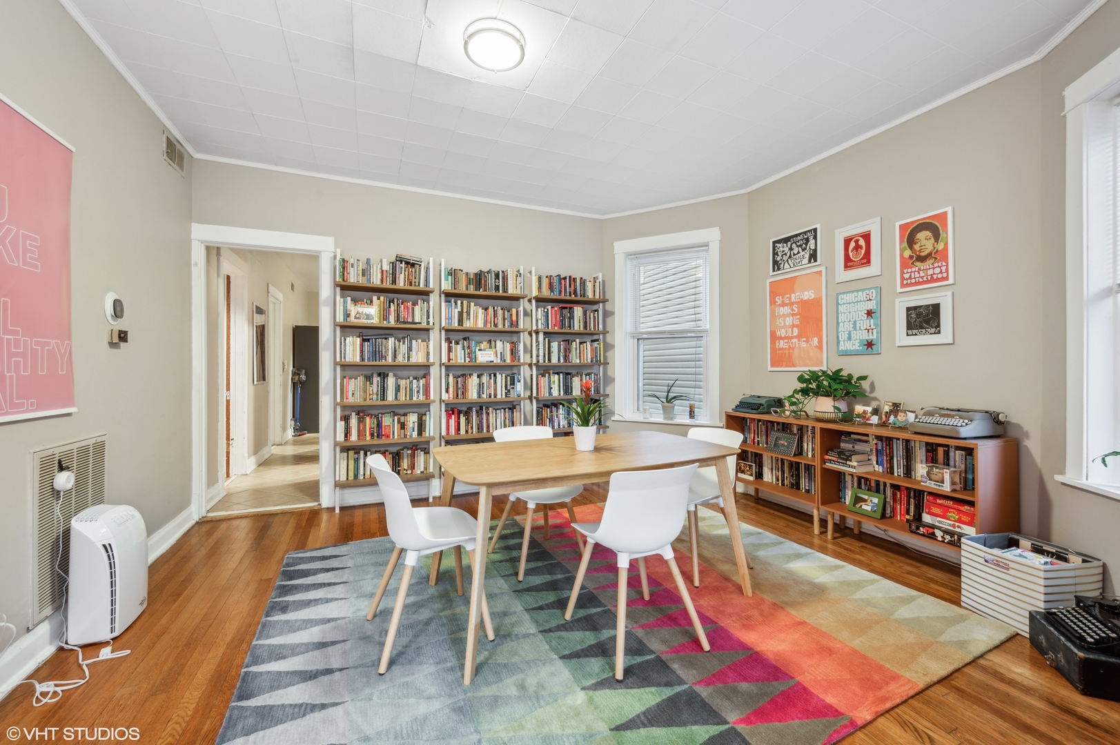 2441 North Avers Avenue Chicago, IL 60647 - Photo 7 of 28 a dining room with furniture and wooden floor