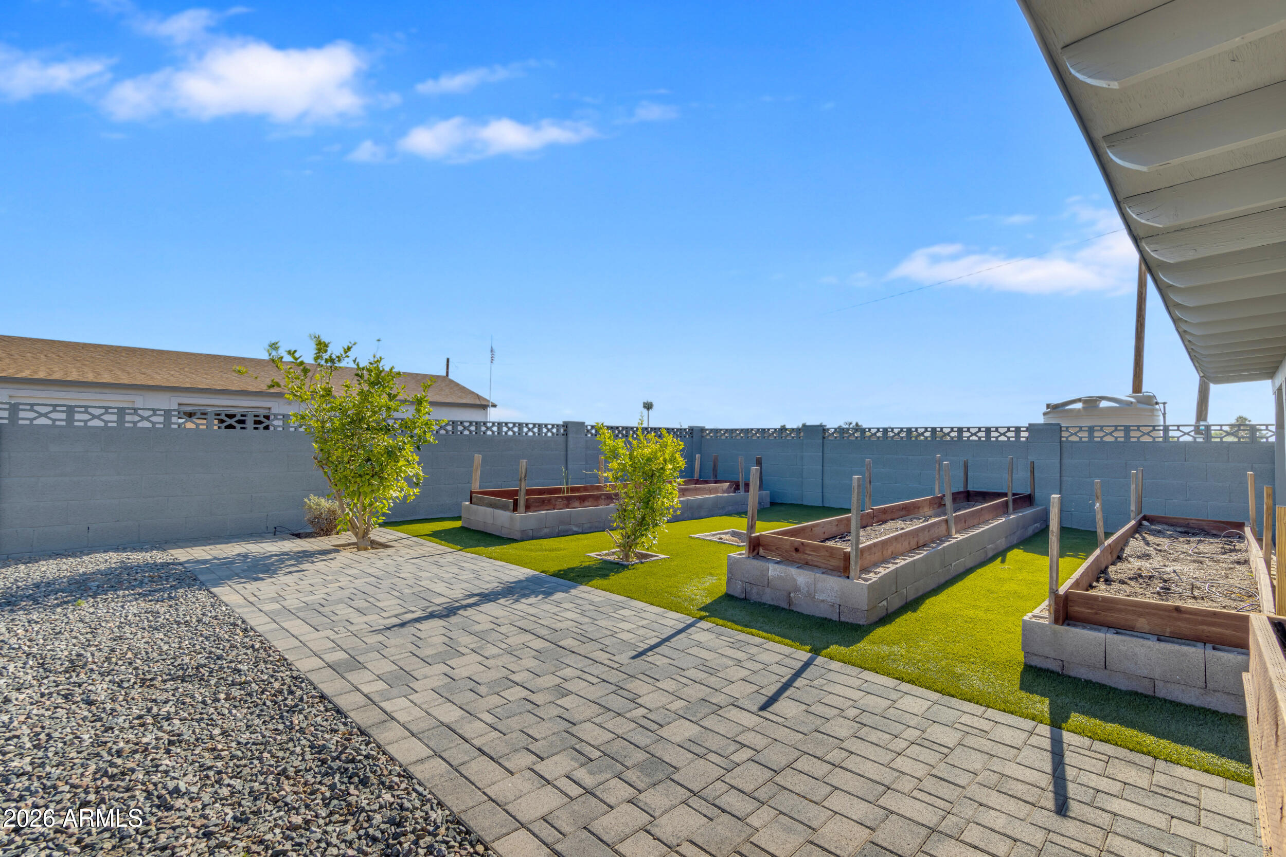 16555 West Lower Buckeye Road Goodyear, AZ 85338 - Photo 3 of 55 Backyard Garden Oasis