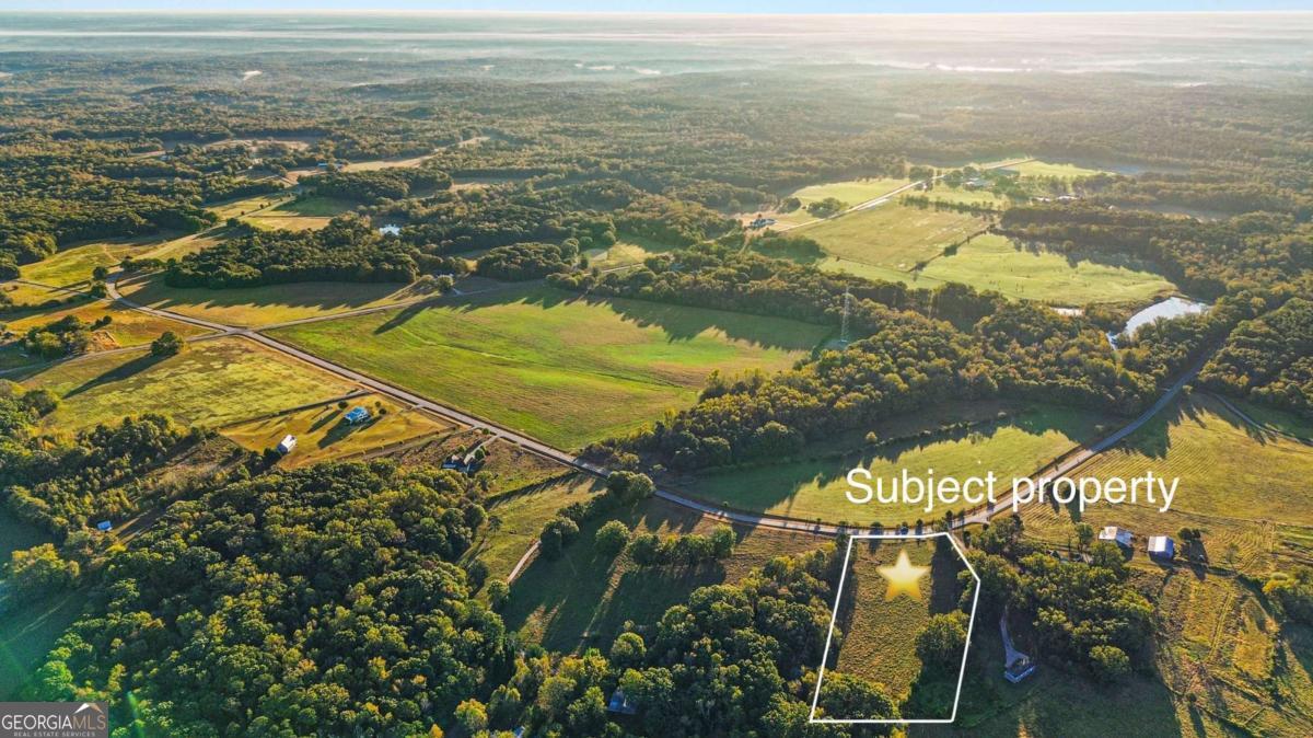 1210 Carson-Graves Road, Unit 2A Watkinsville, GA 30677 - Photo 5 of 16 a view of an ocean and beach