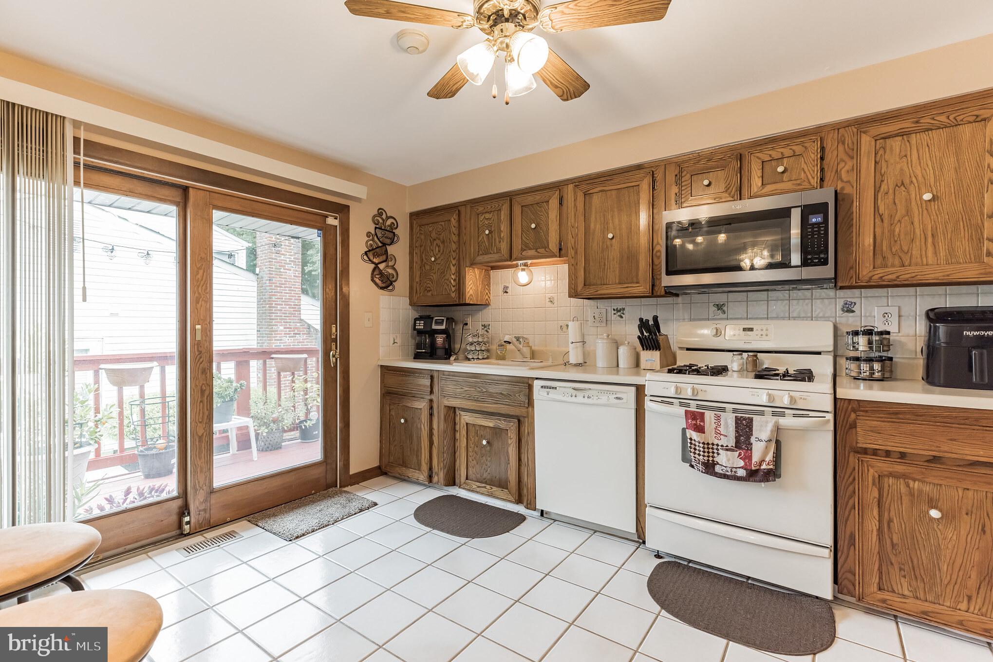 9 Millbridge Road Laurel Springs, NJ 08021 - Photo 12 of 40 slider to deck off kitchen