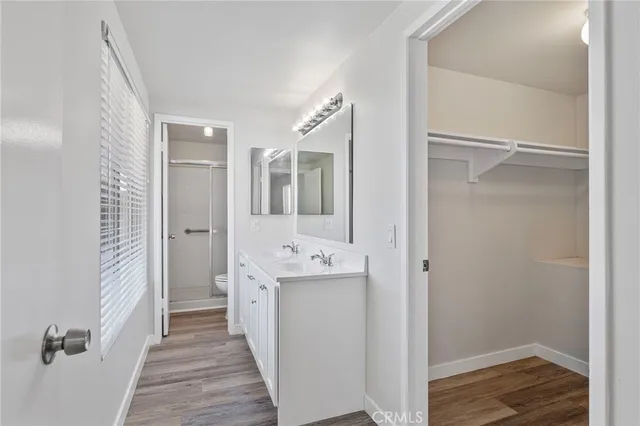 a bathroom with a sink and mirror