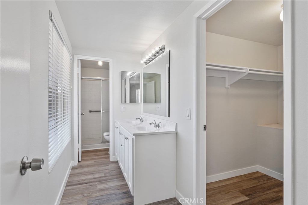 1708 East Cyrene Drive Carson, CA 90746 - Photo 15 of 26 a bathroom with a sink and mirror