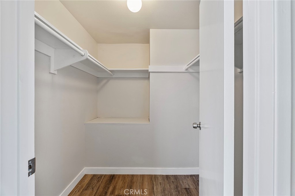 1708 East Cyrene Drive Carson, CA 90746 - Photo 17 of 26 a view of a room with racks on the wall