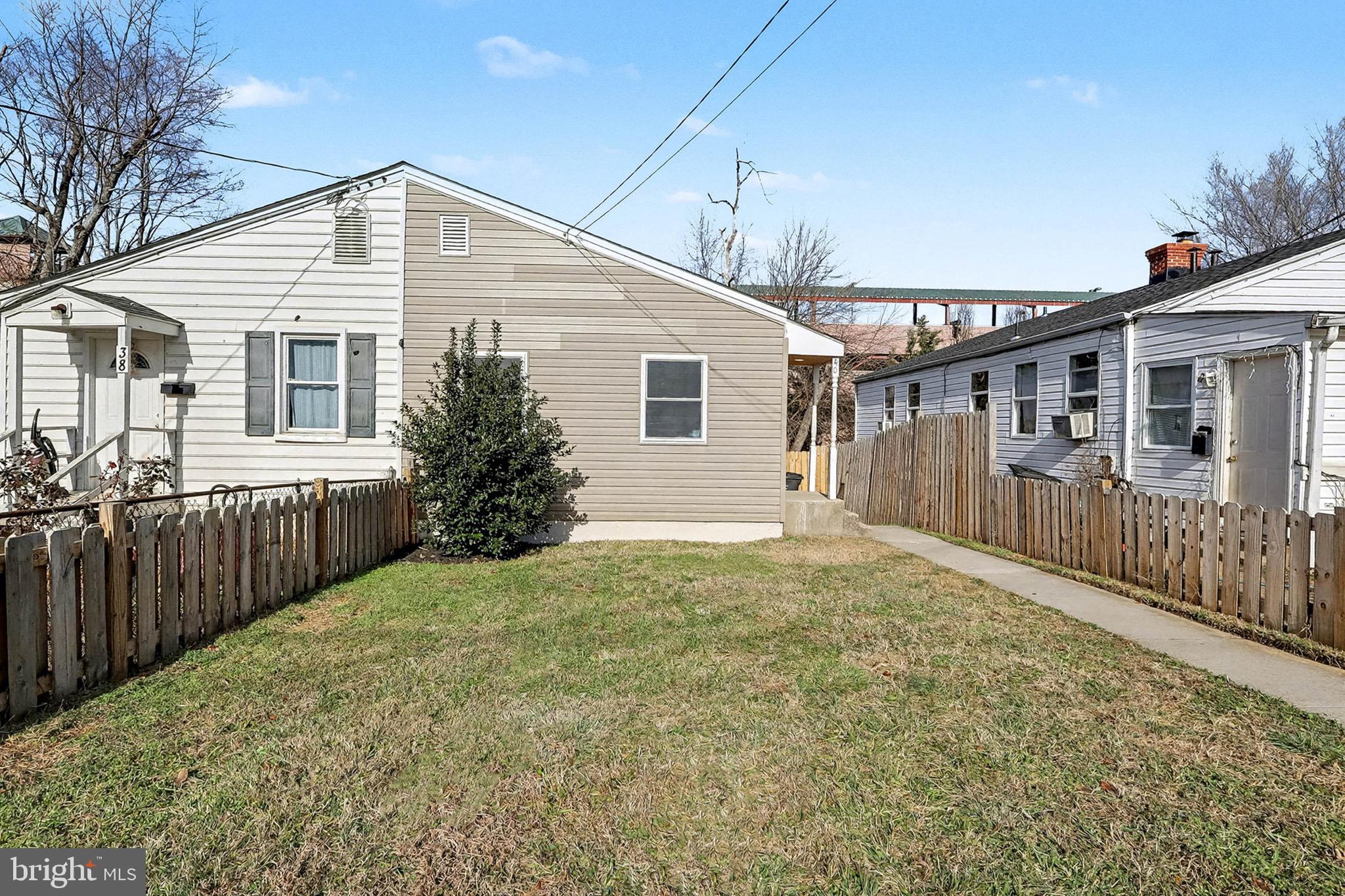 40 East Reed Avenue Alexandria, VA 22305 - Photo 19 of 19 a front view of a house with a yard
