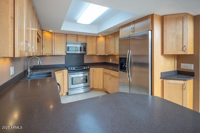 7830 East Camelback Road, Unit 708 Scottsdale, AZ 85251 - Photo 2 of 21 a kitchen with stainless steel appliances granite countertop a sink a stove and a refrigerator