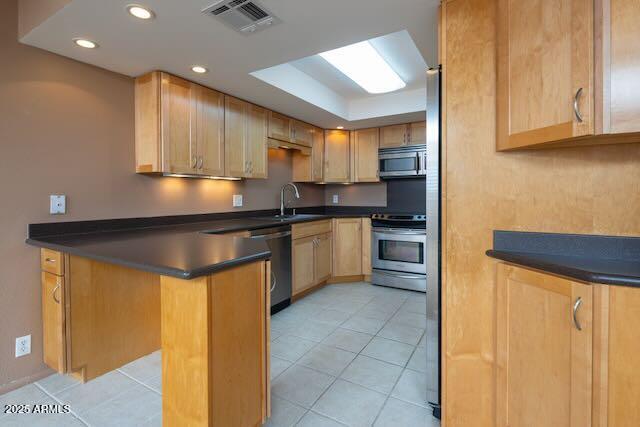 7830 East Camelback Road, Unit 708 Scottsdale, AZ 85251 - Photo 3 of 21 a kitchen with stainless steel appliances granite countertop a sink a stove and a refrigerator